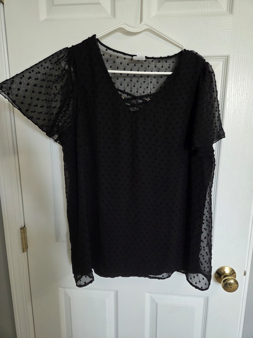 NAIF Black Swiss Dot V-Neck Short Sleeve Top with Crisscross